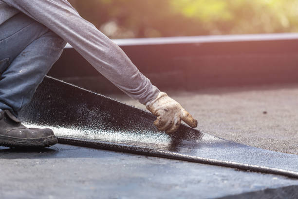 Professional Interior Drainage System technician working in Albertson, NY